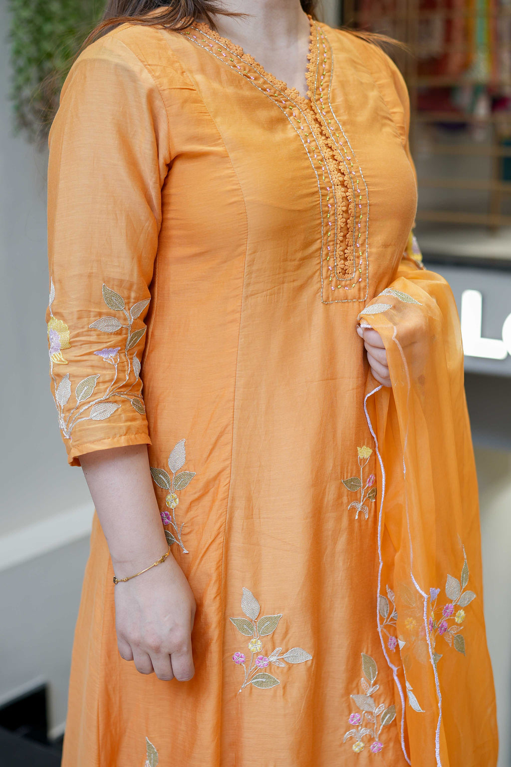 Aadesh Fashion Kesar Orange Muslin A-Line Kurti Pant Set with Scalloped Organza Dupatta
